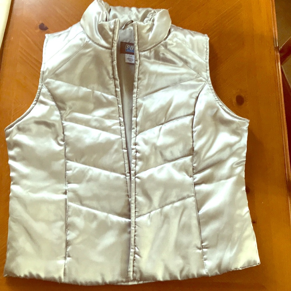 Large silver vest.